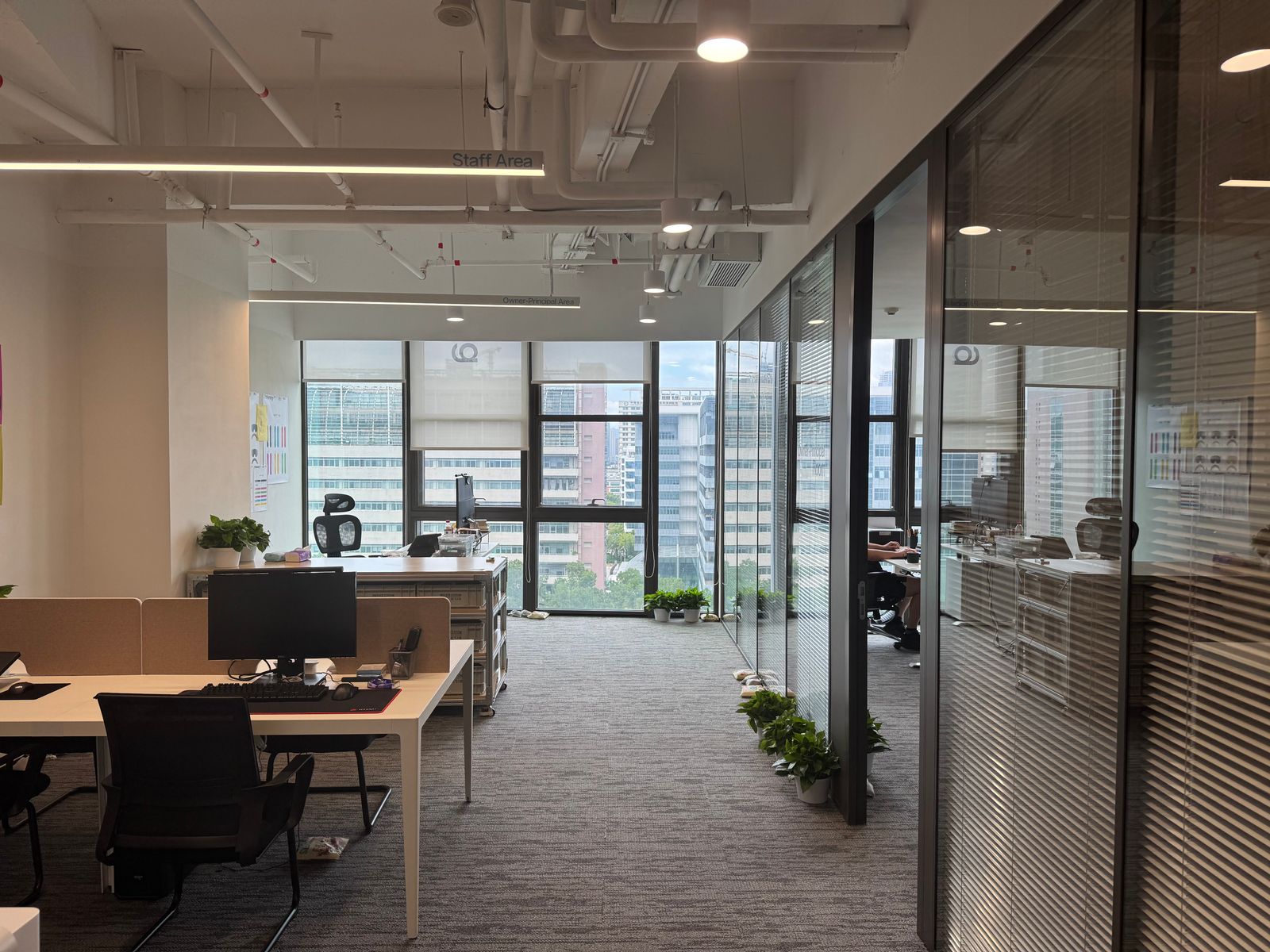 Modern open-plan office with large windows